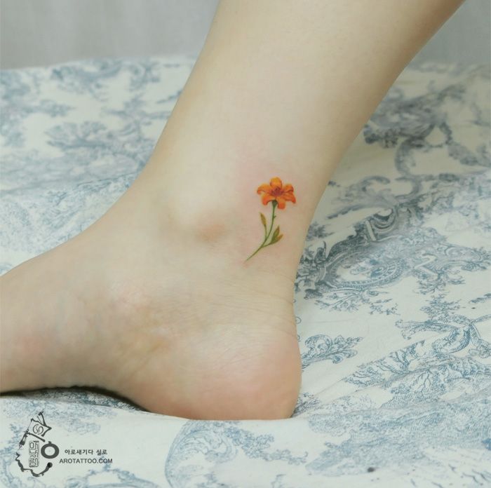 11 tatouages fleuris qui imitent des peintures à l'aquarelle sur la peau | So Busy Girls