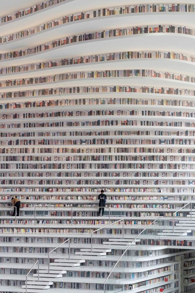 Cette bibliothèque contient plus d'1,2 million de livres et sa structure unique est tout simplement époustouflante | So Busy Girls